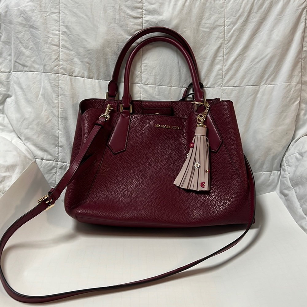 Michael Kors burgundy handbag, with alternate long strap.